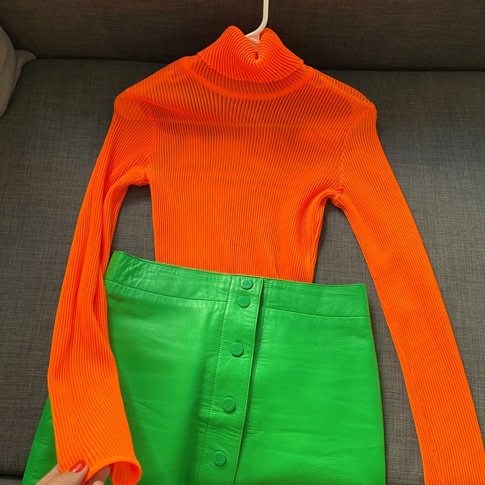Orange turtleneck